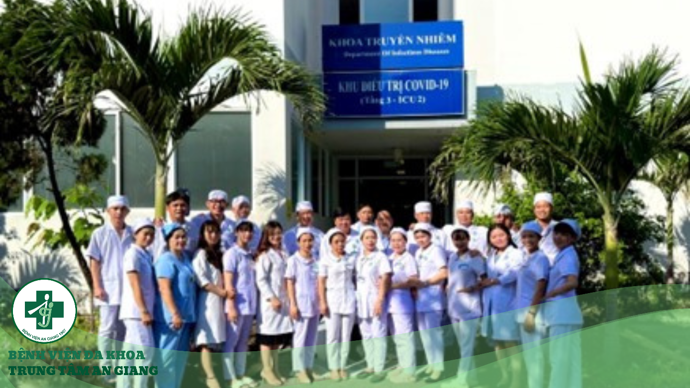 A group of people in white uniforms outside of a building

Description automatically generated