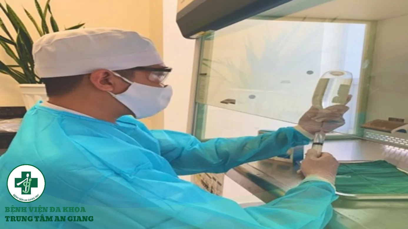 A doctor in a lab coat and mask Description automatically generated