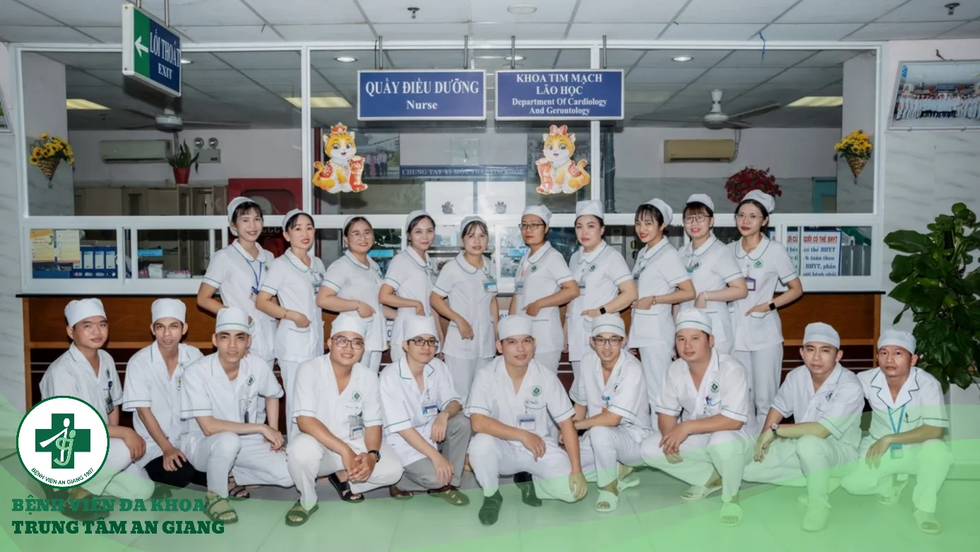 A group of people in white uniforms posing for a photo

Description automatically generated