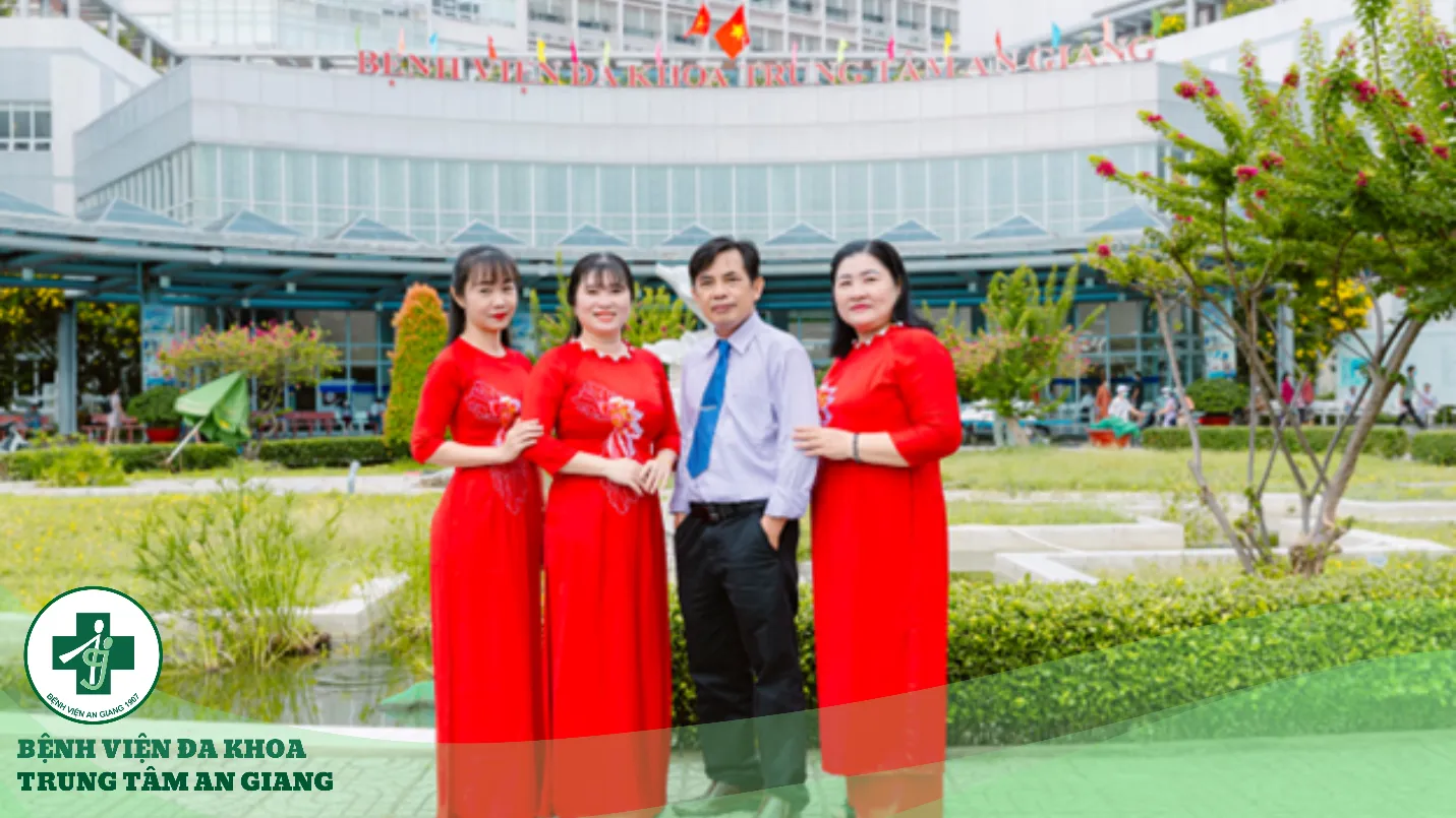 A group of people posing for a photo Description automatically generated