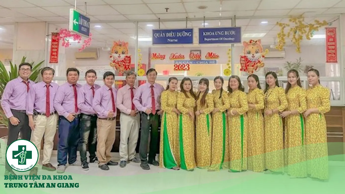 A group of people posing for a photo Description automatically generated
