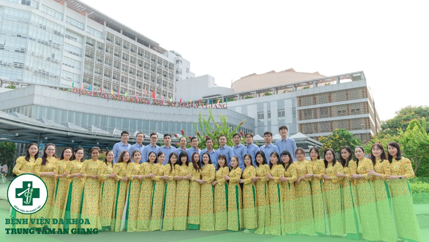 A group of people posing for a photo Description automatically generated