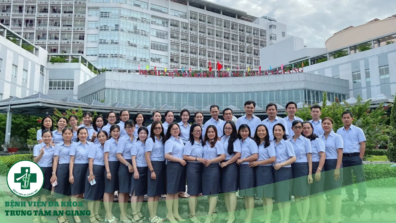 A group of people posing for a photo Description automatically generated
