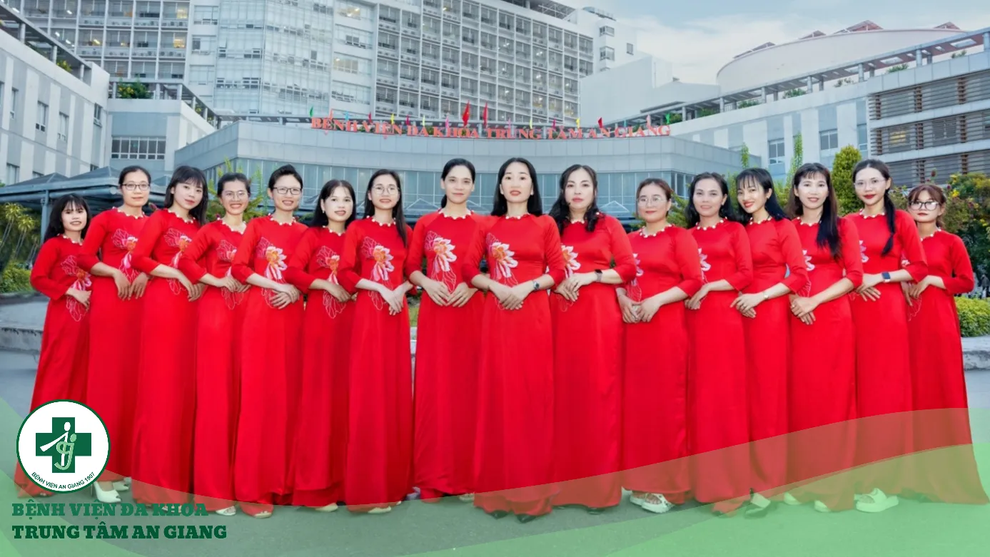 A group of women in red dresses

Description automatically generated
